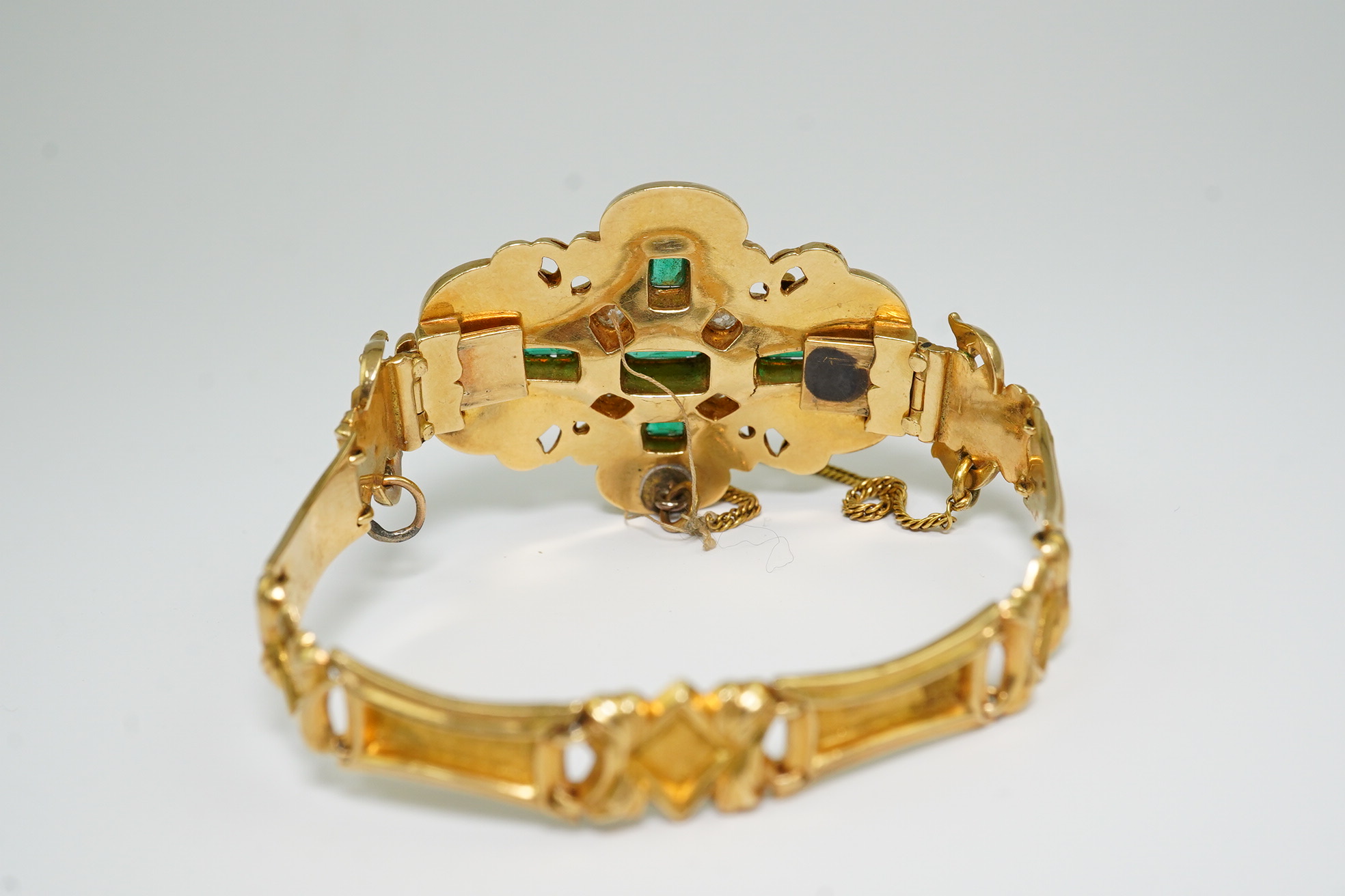 A Victorian gold, diamond and emerald cluster set bracelet